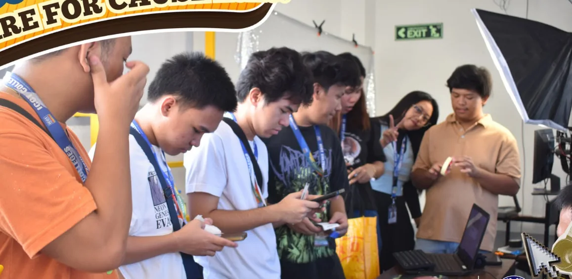 Students participating in a booth activity